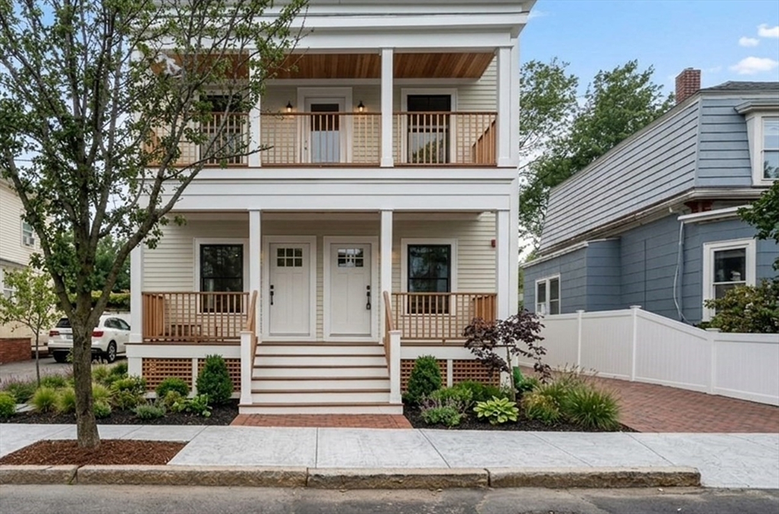 Lowell Street Residences, 326 Lowell Street, Somerville. Double-porch facade of the main residence.
